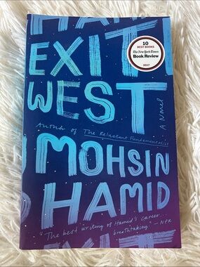 'Exit West' Paperback Book by Mohsin Hamid - Blue